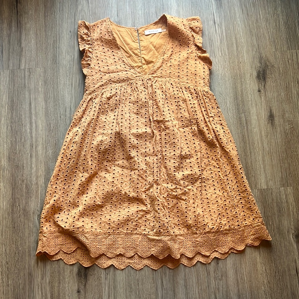 She says “cute dress”